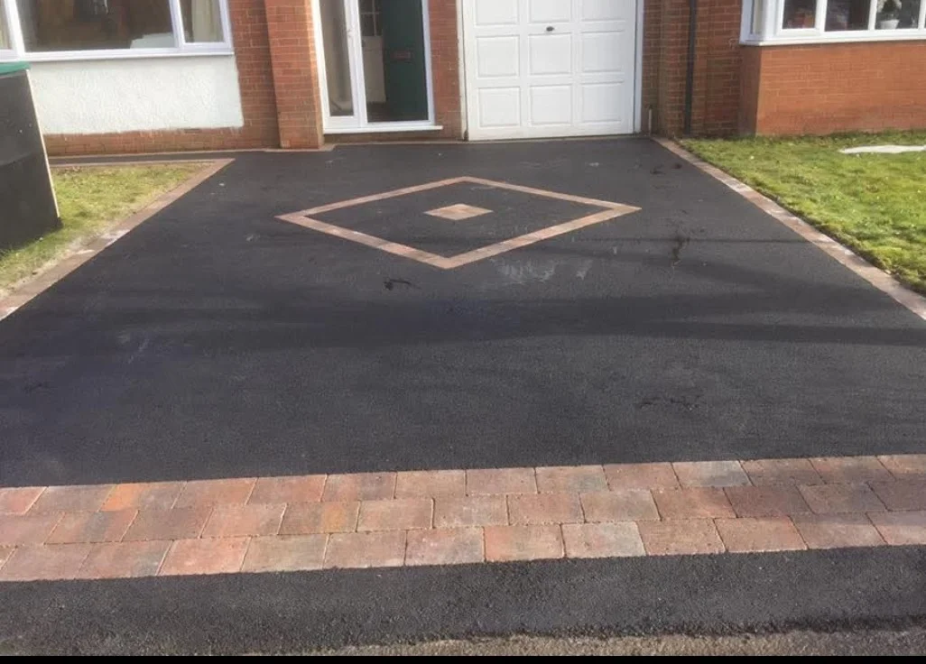Tarmac driveway with a diamond-shaped paving detail